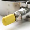 Turbo Hose Clamp Bolt caps by Clamp-aid. For 1/4" Diameter Bolts. Package of 20. Color: Yellow view 1