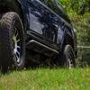 RealTruck Trail Sliders for 4Runner | Cab Length, Heavy Duty, Textured Black | TST10-TX | Fits 2010 - 2024 Toyota 4 Runner Does not fit Limited, TRD Sport, Nightshade and 10-13 SR5 Models view 4