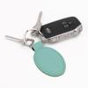 LaserGram Oval Keychain, Horse Head 1, Personalized Engraving Included (Basketball Teal) view 2