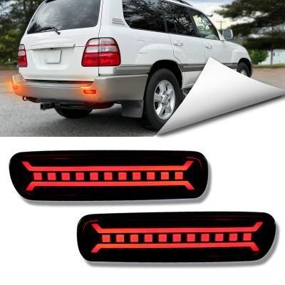 BINQIGOO LED Rear Bumper Reflector Lights Trim for Toyota Land Cruiser LC100 1998-2007, for Lexus LX470| Red Sequential Turn Signal,DRL&Brake Light |Replacement for OEM 8191048050, 8192048050 (Smoked)