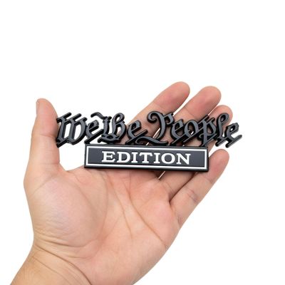 We The People 3D Full Metal Car Emblem - American Patriotic Raised Badge for Truck, Jeep, SUV - Heavy Duty Automotive Exterior Decoration (2 Pack, Black & White)