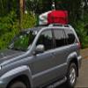 Kanga Waterproof Rooftop Cargo Carrier Storage Roof Bag - Universal Fit - Available in 4 Unique Styles (Canada Flag, Mexico Flag, American Flag, and Woodstock) - 14 Cubic feet Capacity. Built in USA view 2